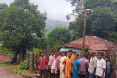 Installed-Solar-Street-Lights-with-local-wooden-pole